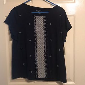 Navy blue shirt with white details.